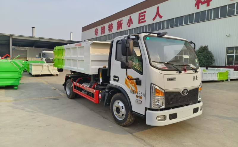 重汽豪曼藍(lán)牌勾臂垃圾車